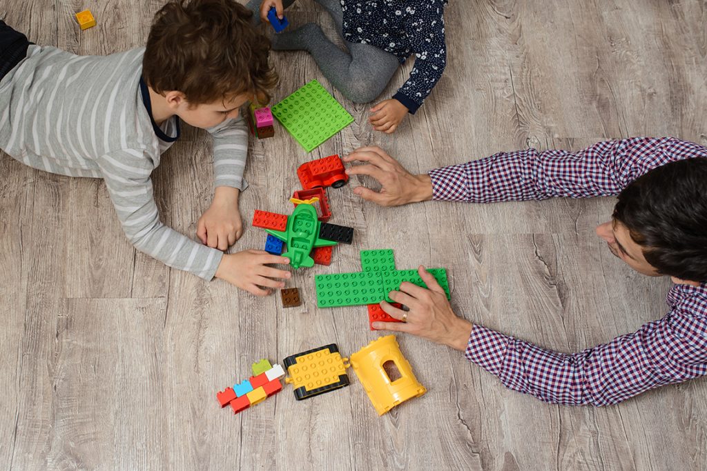 A child playing with legos.